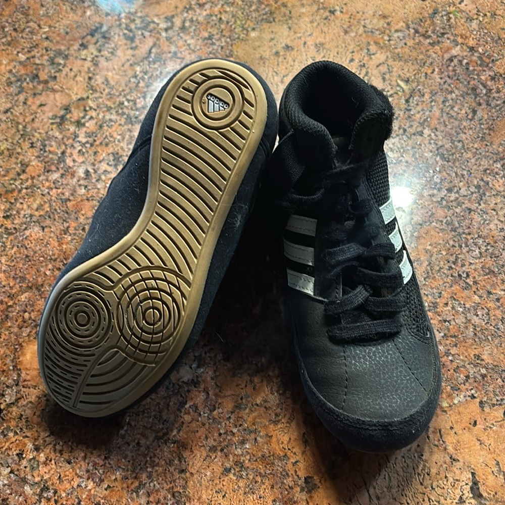 Size 1 Adidas girls or boys wrestling shoes.